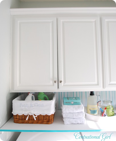 cg laundry room white cabinets and shelf
