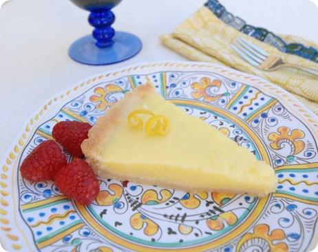 lemon tart slice with raspberries