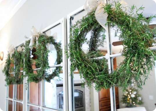 3 rosemary wreaths on mirror