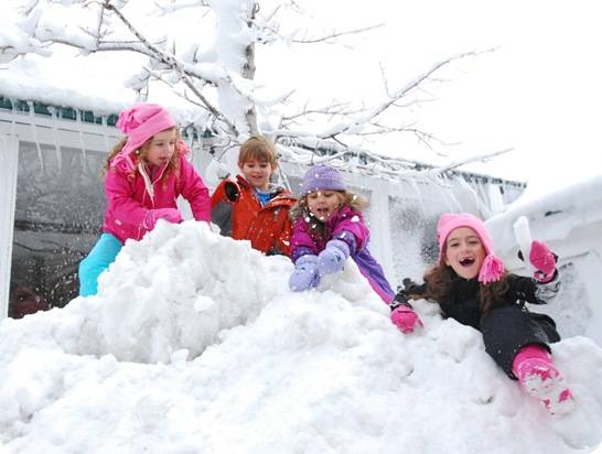 kids playing on snow