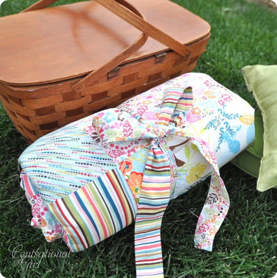 cg patchwork picnic blanket tied up
