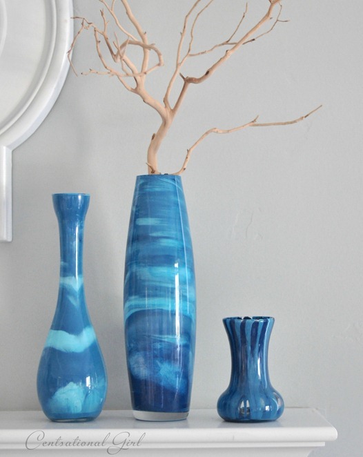 blue paint swirl vases on mantel