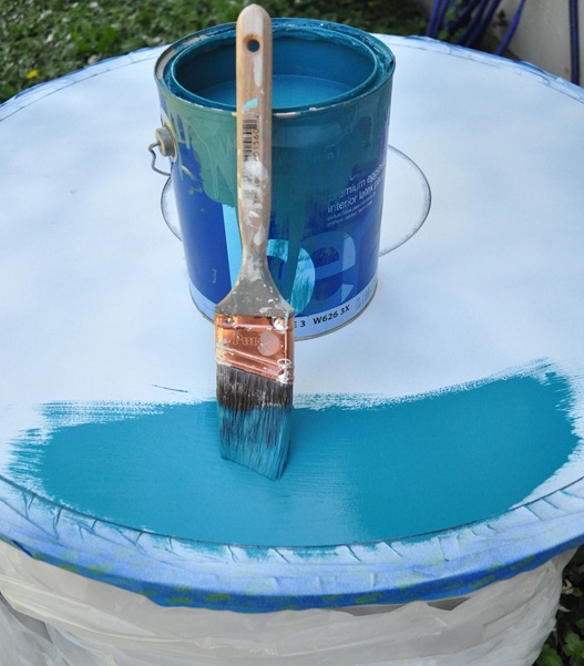 teal paint on table