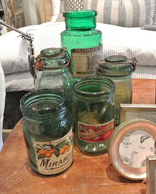 vintage labels on green glass jars