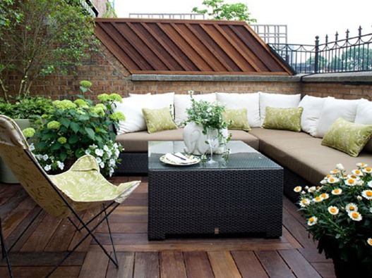 soft green pillows on patio