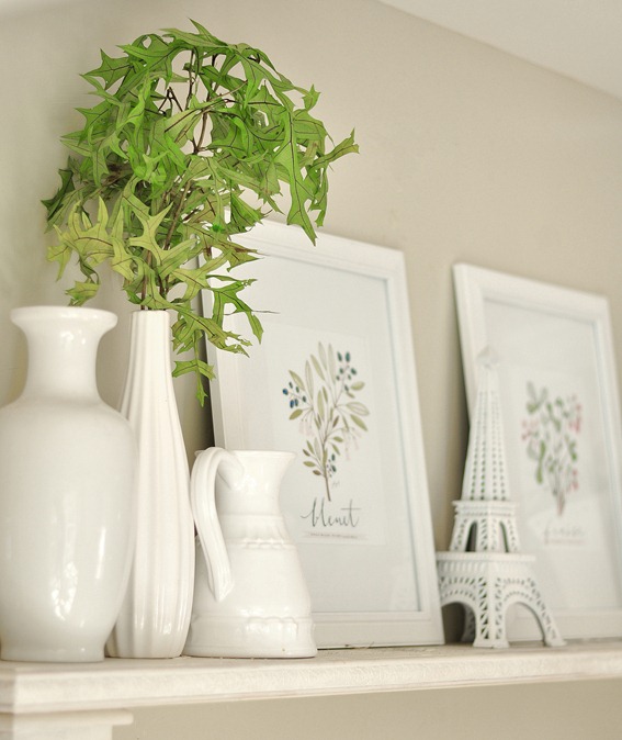 vase and prints on mantel