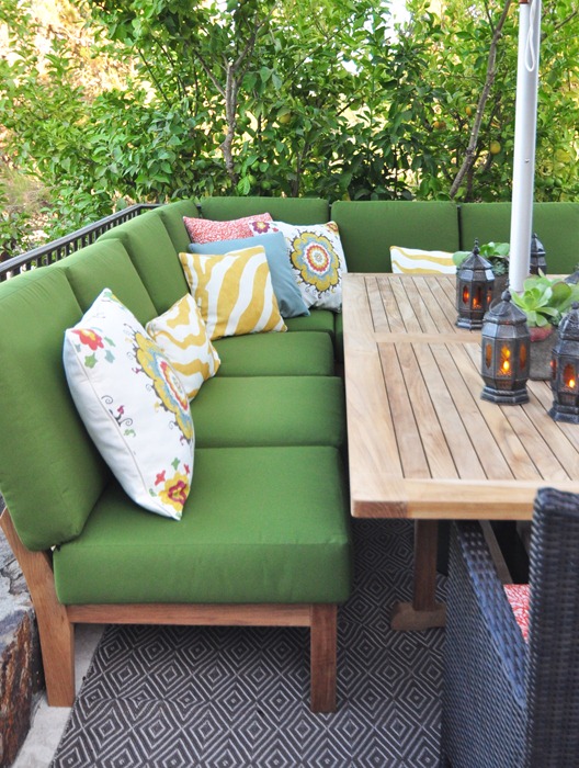 green outdoor sectional and table
