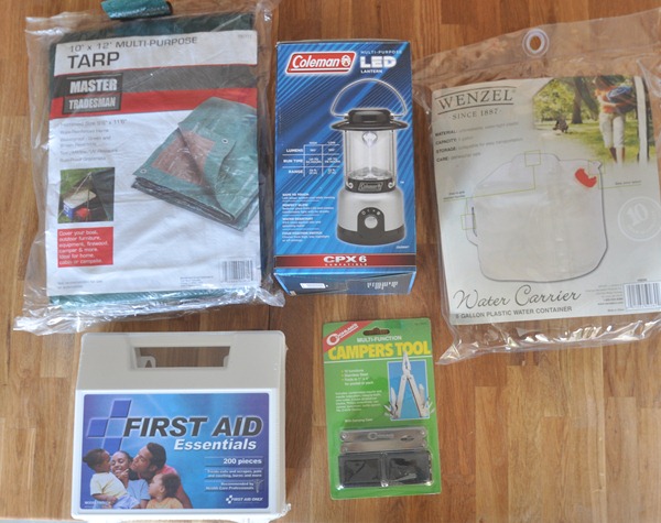 tarp lantern water carrier camper's tool first aid kit