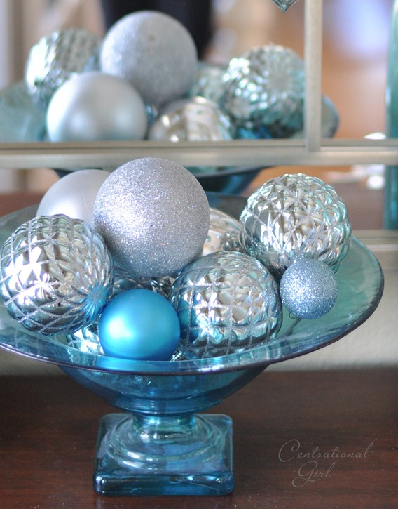 blue glass compote with ornaments