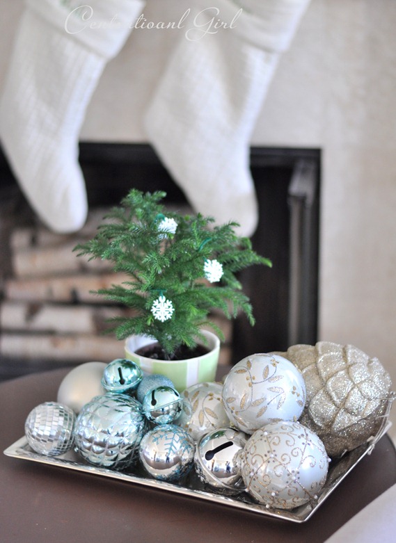 pile of ornaments on silver tray