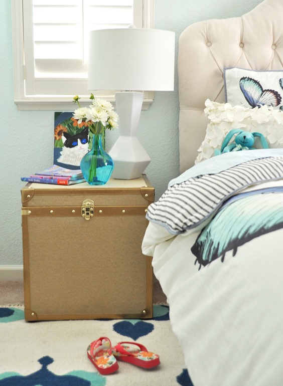 tufted headboard and linen chest nightstand