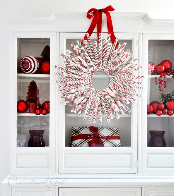 wrapping paper wreath on hutch