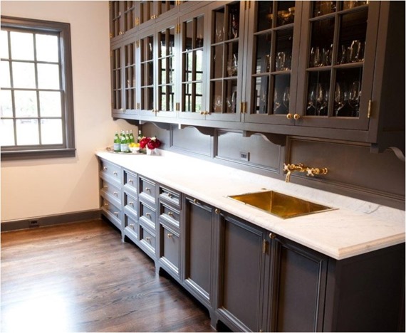 brass knobs gray cabinetry