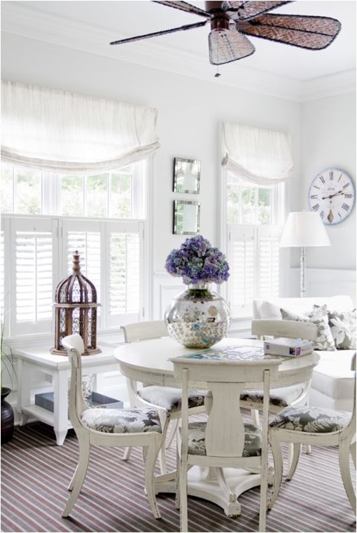 white sunroom dining space