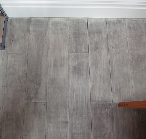 gray plywood floor