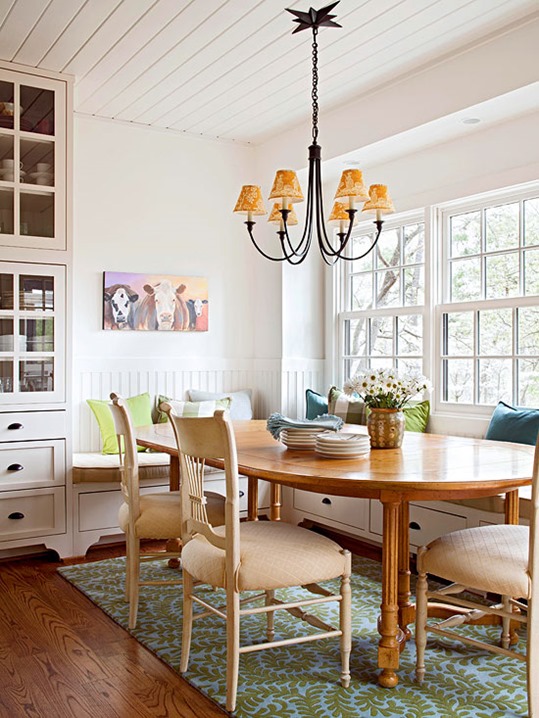 banquette with wood table bhg