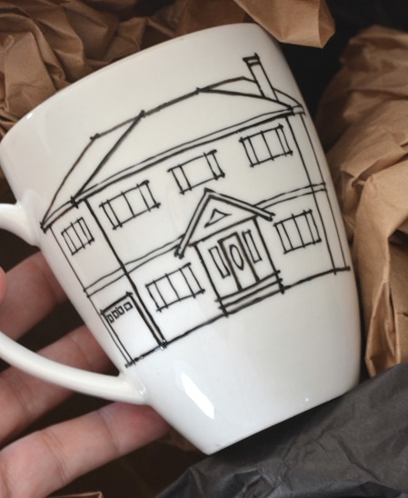mug with sketch of house