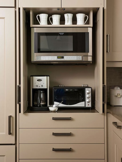 gray cabinets with appliance storage
