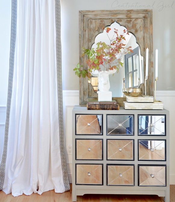 greek key panels and mirrored chest