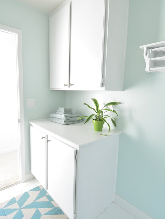 white painted laundry room cabinets copy