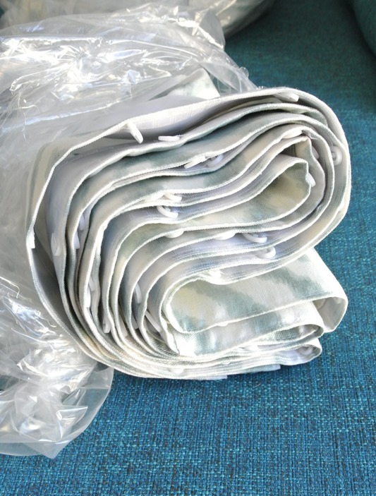 plastic wrapped drapes