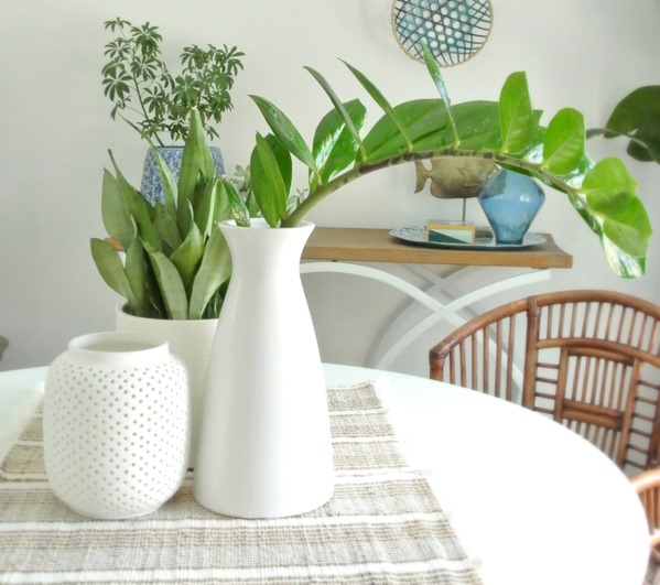 white vases on table