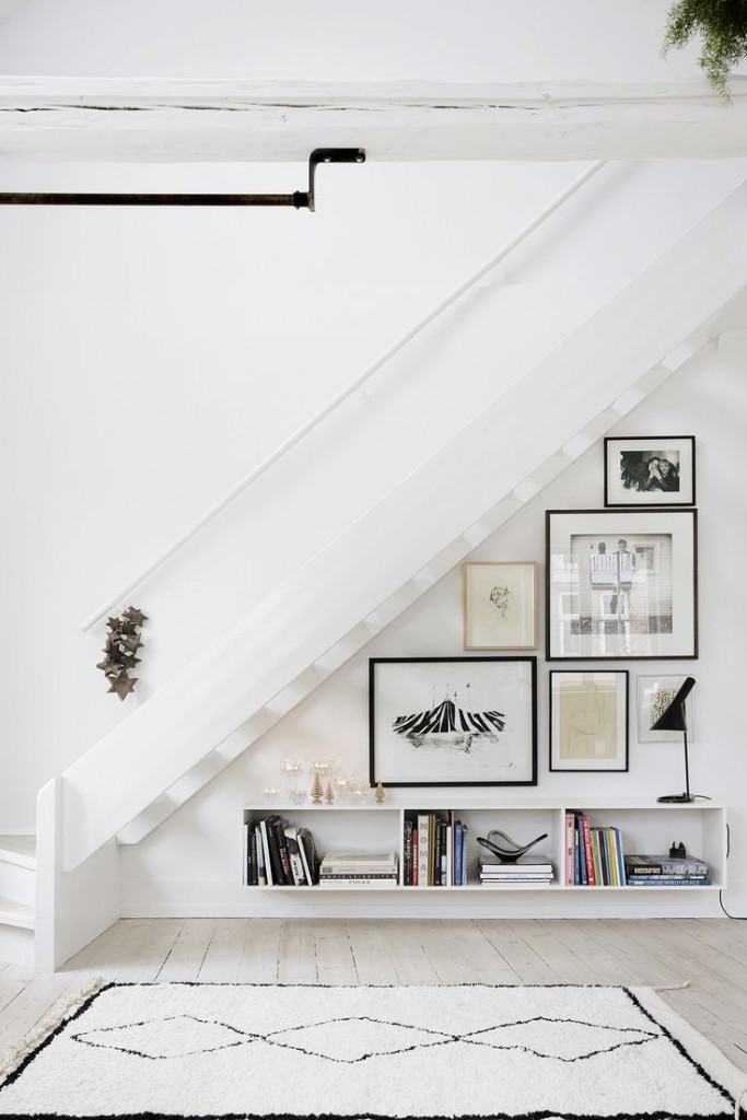 gallery wall under stairs