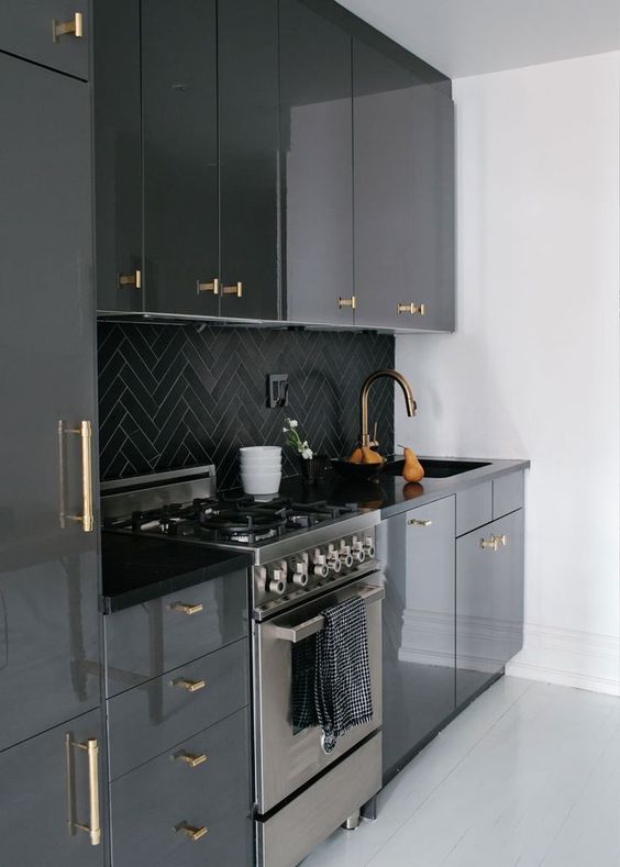 black and brass kitchen