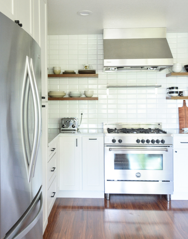 white kitchen remodel beveled tile backsplash