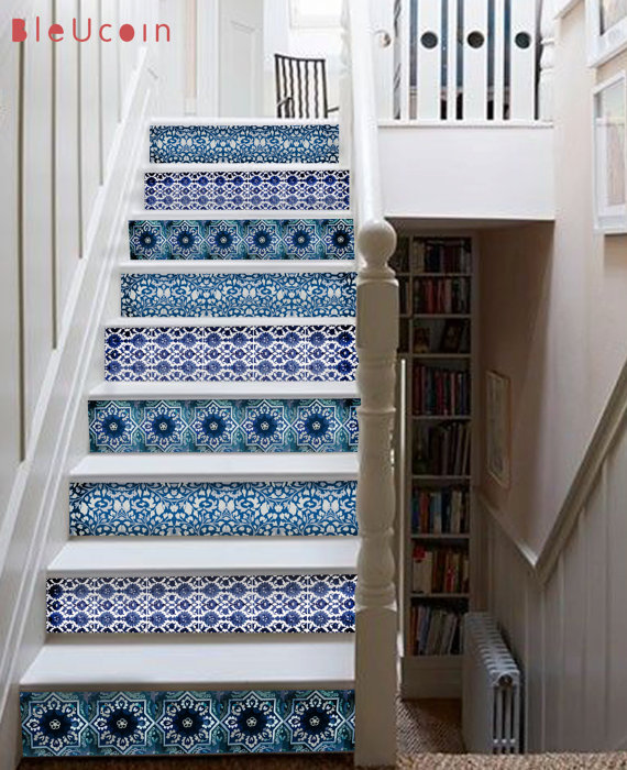 blue and white tile decals on staircase