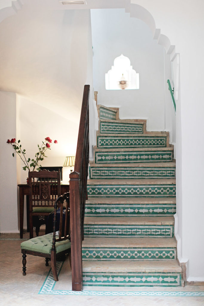 green moroccan tiled staircase