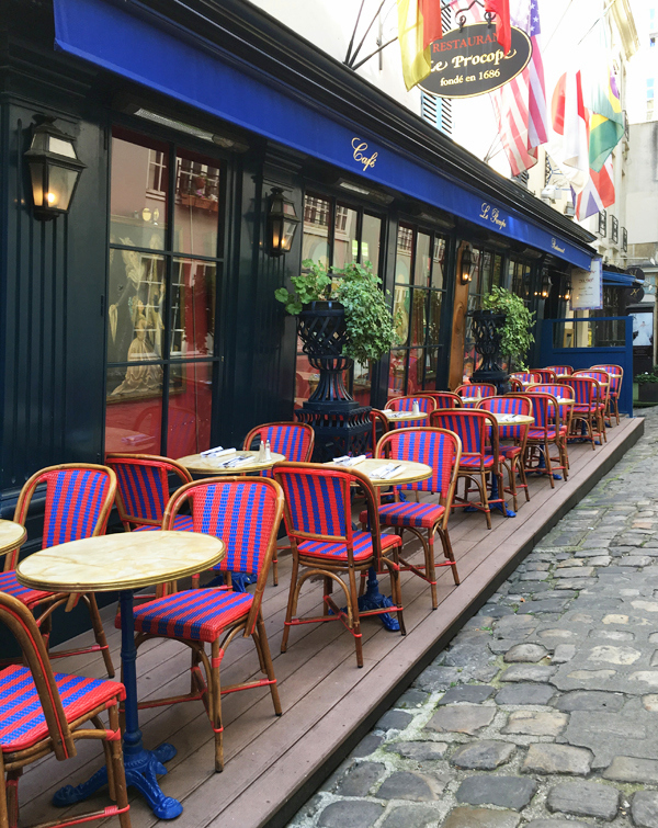 striped chairs parisian cafe