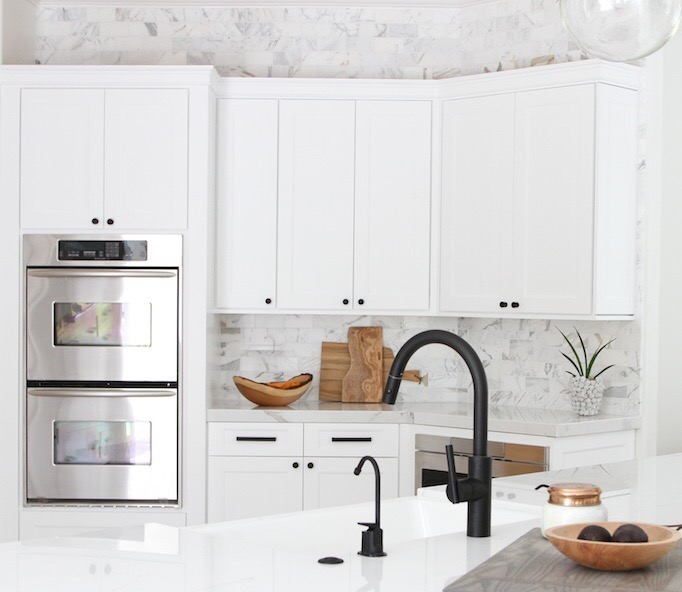 black-faucet-white-kitchen