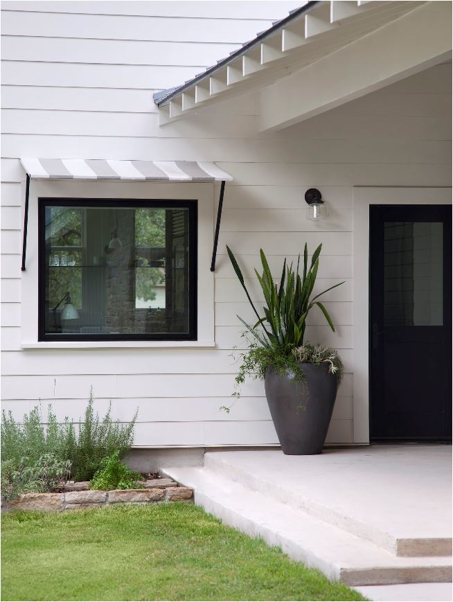 black window with awning